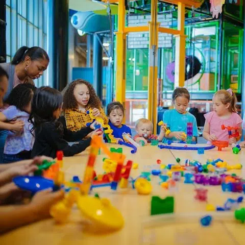 Children building using abstract toys in the museum